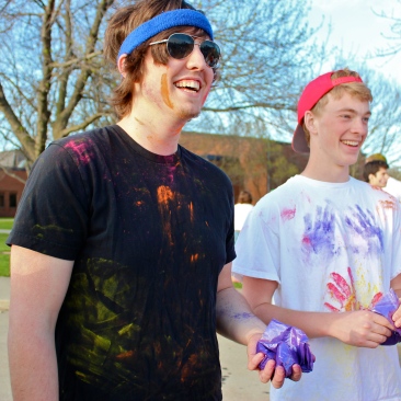 Josh James and Doug Schaefer save (most of) their powder as they chat with friends before the fight begins. Although students could begin purchasing bags of powder even before the event started at 7 p.m., powder-throwing did not begin until 7:30.